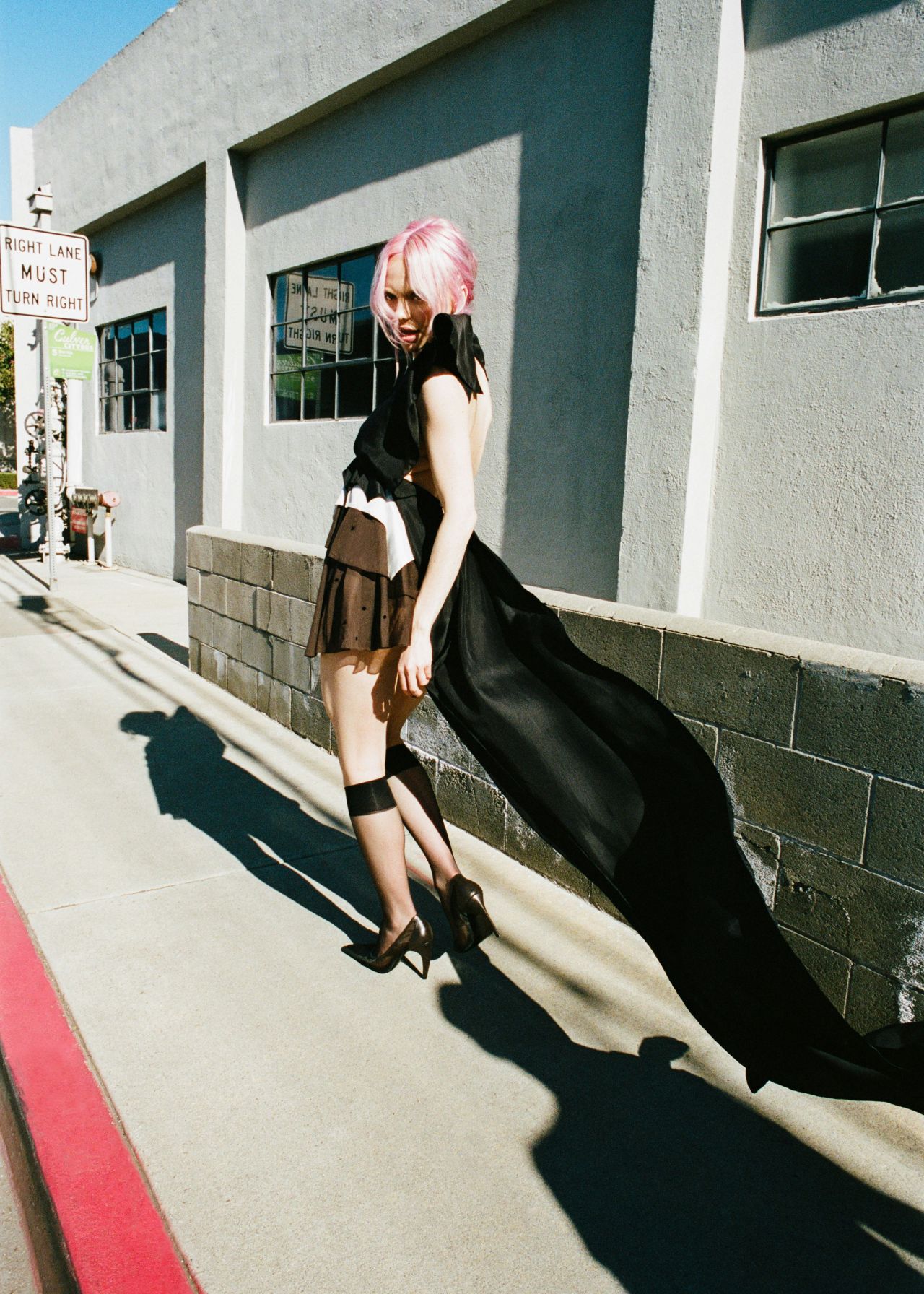 adela-for-nylon-january-2026-beige-corset-black-fringe-urban-sheer-1