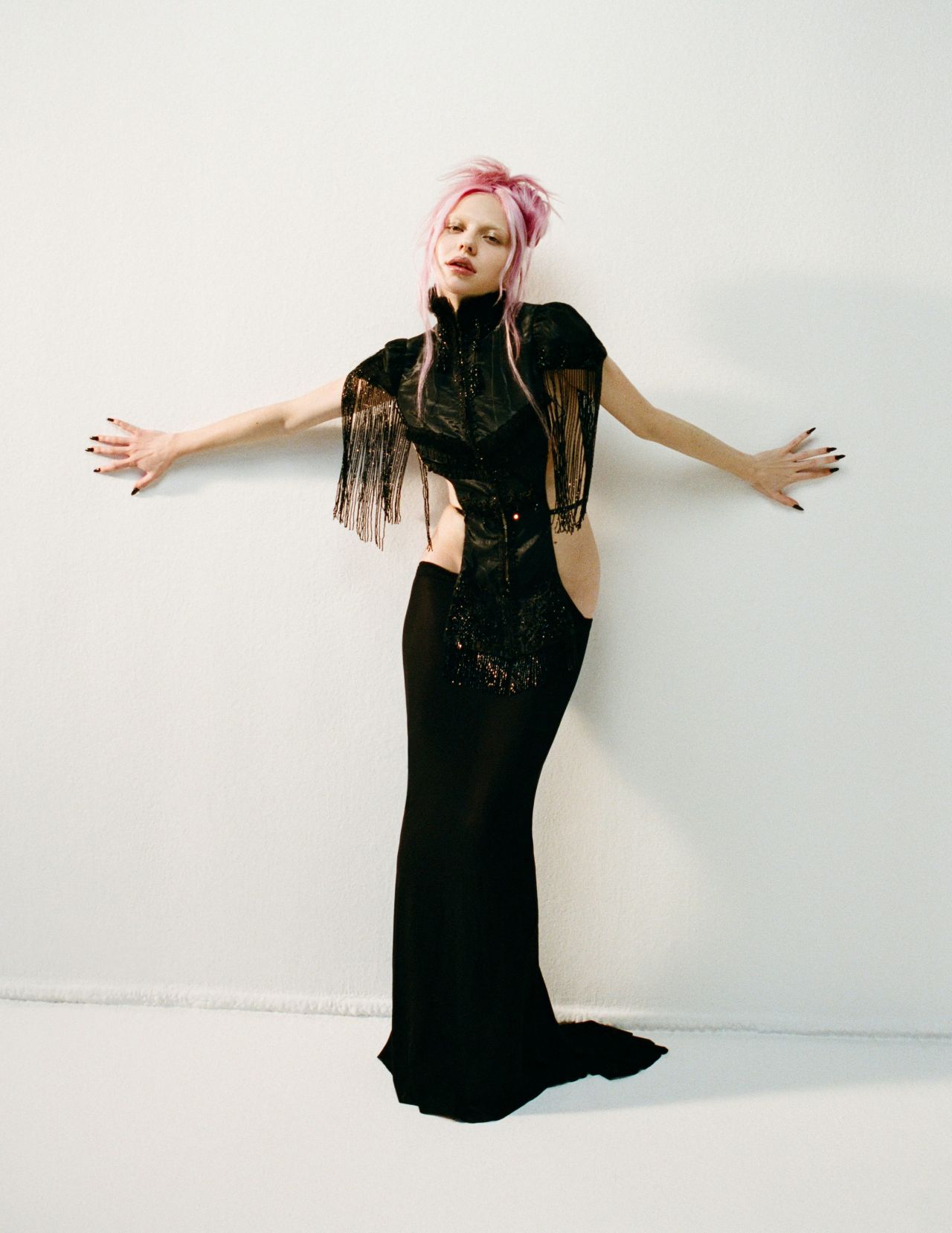 adela-for-nylon-january-2026-beige-corset-black-fringe-urban-sheer-5