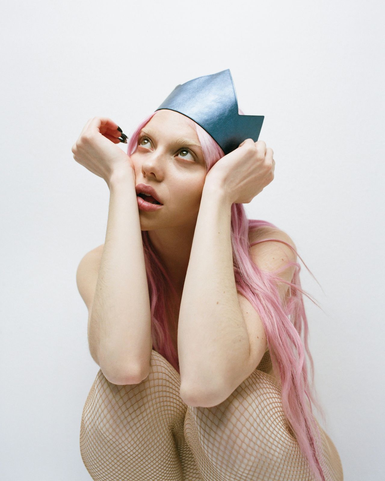 adela-for-nylon-january-2026-beige-corset-black-fringe-urban-sheer-7