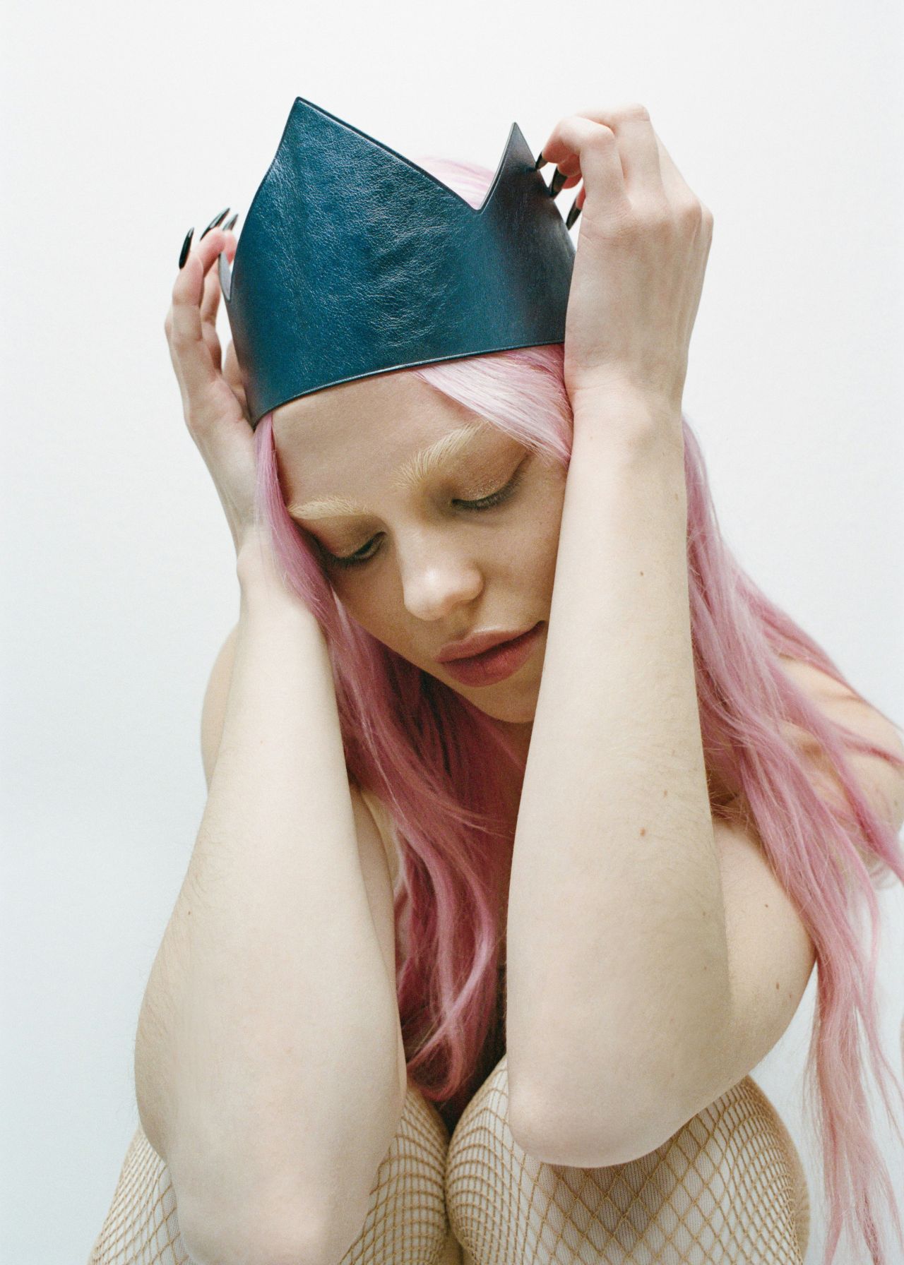 adela-for-nylon-january-2026-beige-corset-black-fringe-urban-sheer-9